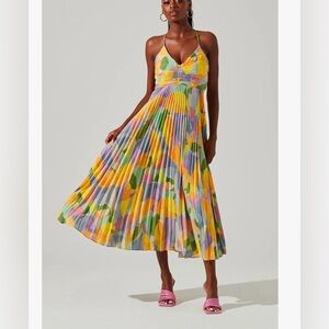 Colorful, backless, pleated dress